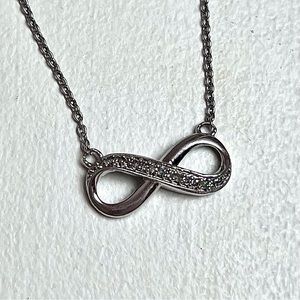 16” Sterling silver infinity necklace lined with real diamonds